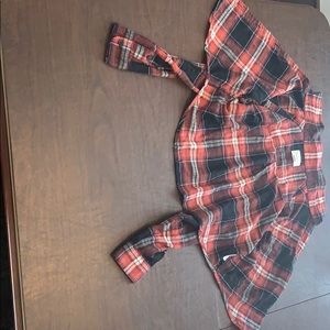 A flannel crop top